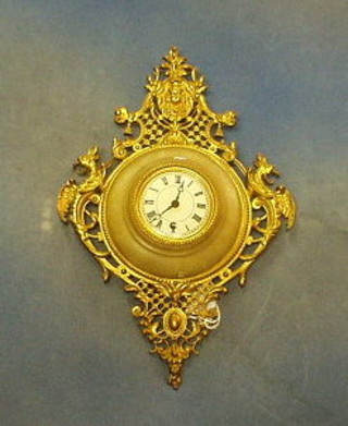 A 19th Century French "Cartel" clock, the 3" circular painted dial with Roman numerals, contained in a pierced gilt metal and alabaster case