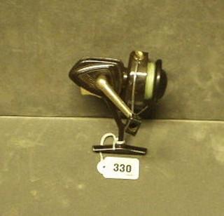 An unmarked multiplying fishing reel