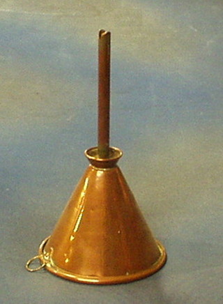 A large copper funnel