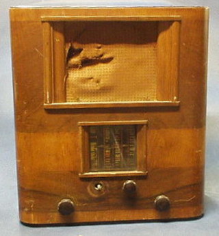 A Bush radio contained in a walnutwood case