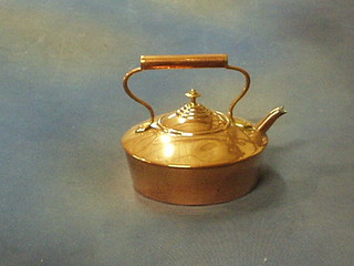 A circular copper kettle