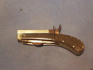 A 19th Century Unwin & Podcips patented double bladed knife pistol with 3 1/2" octagonal steel barrel and carved horn grip