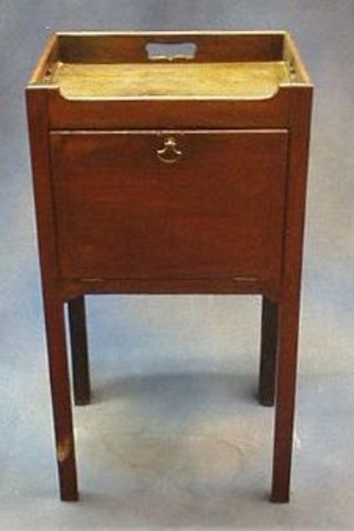 A Georgian mahogany tray top commode with fall front, raised on square tapering supports 17"