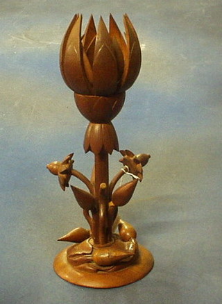 A carved Eastern ornament in the form of a flower head 15"