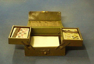 2 sets of 1930's playing cards contained in a green leather case