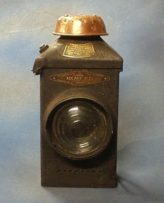 An Adlake No. 22 railway lamp marked LMS