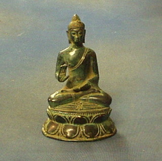 A bronze figure of a seated Buddah 6"