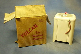 A Vulcan toy washing machine, boxed