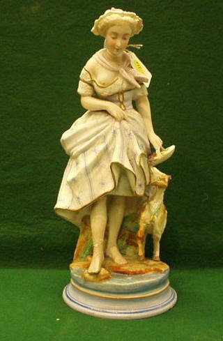 A  19th Century Continental biscuit porcelain figure of a standing shepherdess and ram 3" (f)
