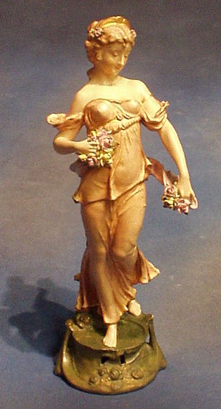 A 19th Century Austrian porcelain figure of standing lady with garland of flowers,  base impressed Made in Austria 1731 (slight chips) 15"
