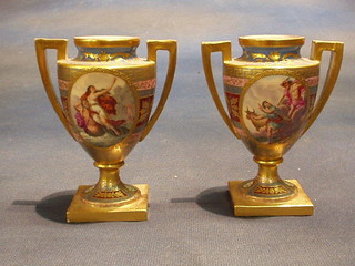A pair of Vienna porcelain twin handled urns with panel decoration depicting classical scenes 5"