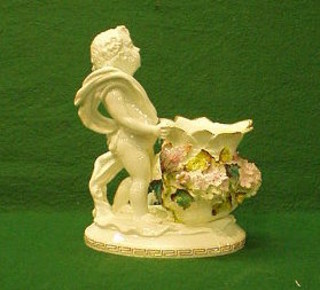 A 19th Century Continental floral encrusted vase supported by a figure of a cherub (f and r) 8"