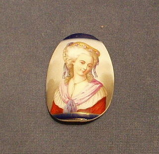 An 18th/19th Century convex oval porcelain plaque depicting a  portrait of a young lady 3"