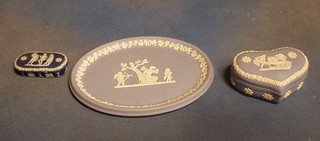 A Wedgwood blue Jasperware oval platter, the base incised WW 9", a heart shaped trinket box 4" and a dark blue oval Wedgwood box 3 1/2"