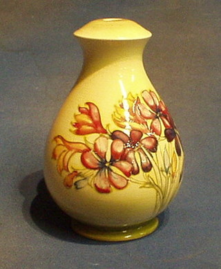 A William Moorcroft Spring Flowers pattern lamp base, impressed Moorcroft Made in England and remains of paper label, 8"