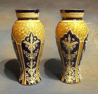 A pair of large blue ground and gilt banded Doulton Lambeth vases, impressed 9976 11"