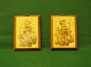 A pair of Hummel wall plaques of children, on wooden plaques 6" x 5"