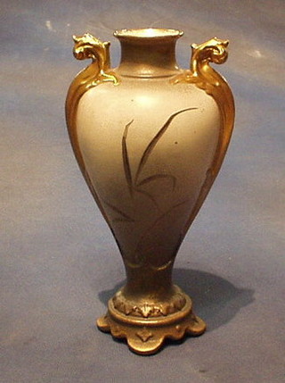 An Art Nouveau Lotus ware twin handled vase with floral decoration 11"