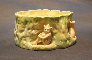 A Sylvac vase in the form of a tree stump decorated rabbits, the base marked Sylvac and impressed 1513 7"