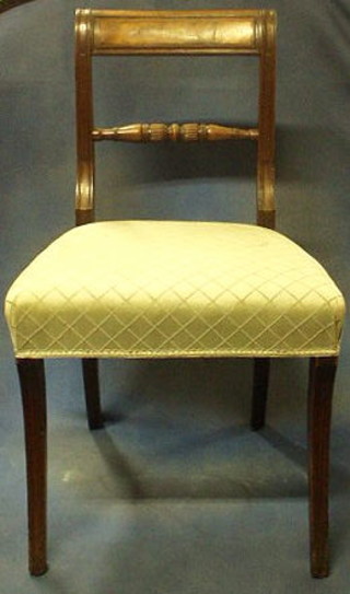 A set of 3 Georgian mahogany bar back dining chairs with turned mid rails on sabre supports