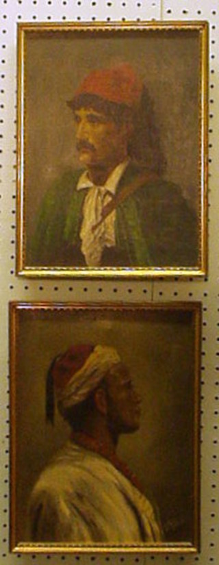 A pair of oil paintings on canvas portraits of "Eastern Gentleman in Costume" monogrammed D J B, dated 1901 12" x 8"