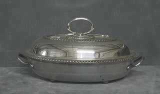 An oval silver plated dish cover