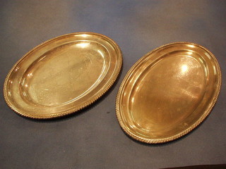 A pair of oval silver plated salvers