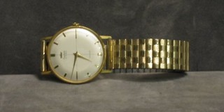 A gentleman's wristwatch by Audax contained in a "gold" case