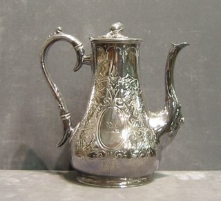 A  Britannia metal coffee pot and an Eastern embossed silver flower ring