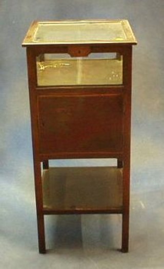 A Georgian mahogany wash stand converted to a bijouterie table, enclosed by glazed panelled doors, the base fitted a cupboard with undertier, 15"