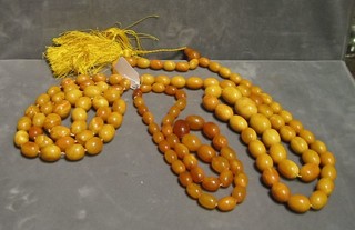 3 strings of amber beads