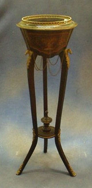 A 19th Century French inlaid marquetry jardiniere with pierced brass gallery and with ormolu horse head mounts