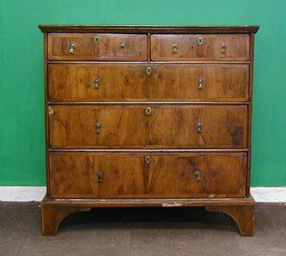 A Queen Anne walnutwood chest of 2 short and 3 long graduated drawers, raised on bracket feet 41"