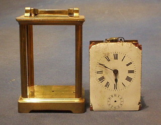 A 19th Century French carriage clock with enamelled dial and Roman numerals (requires some attention)