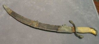 A 19th Century Eastern crescent shaped dagger with 15" blade and ivory grip