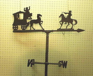 An iron weather vein in the form of a highwayman with coach