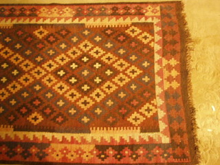 A contemporary Kelim rug 68" x 37"