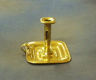 A 19th Century brass chamber stick