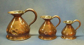 A set of 3 Victorian copper harvest measures - half gallon, 1 12th and half a pint