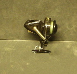 An unmarked multiplying fishing reel