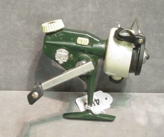 An Abu cardinal 44 x multiplying fishing reel