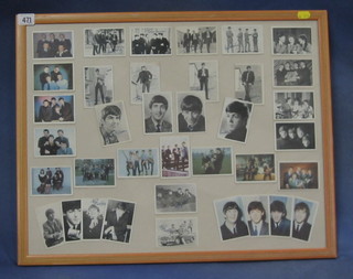 37 coloured and black and white cards of the Beatles, framed