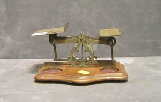 A pair of brass postage scales (no weights)