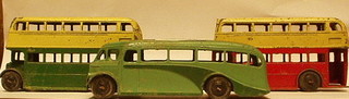 A Dinky Meccano motor coach and 2 Dinky "Route Master" double decker buses