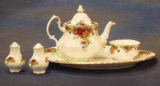 A 44 piece Royal Albert Old Country Rose pattern dinner/tea service comprising 6 10 1/2" dinner plates, 6 8 1/2" side plates, 6 6" tea plates, 4 pudding bowls, oval meat plate, sugar bowl, cream jug, 2 peppers, 6 cups and saucers, 2 breakfast cups and saucers