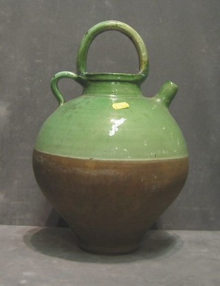 A green and brown terracotta jug 17"