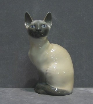 A Royal Copenhagen figure of seated Siamese, base marked 3281 (cracked) 8"