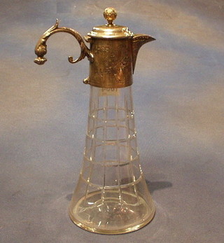 An Edwardian Continental cut glass claret jug with silver plated mounts