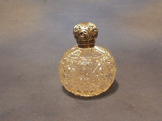 An Edwardian cut glass globular dressing table jar with embossed silver collar Birmingham 1903