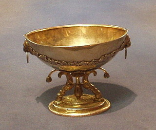 A German silver boat shaped bowl with cast vinery decoration and lion drop handle, raised on 2 hoof supports with oval base 6", 10 ozs (reputedly from the Estate of Lord Farnham)